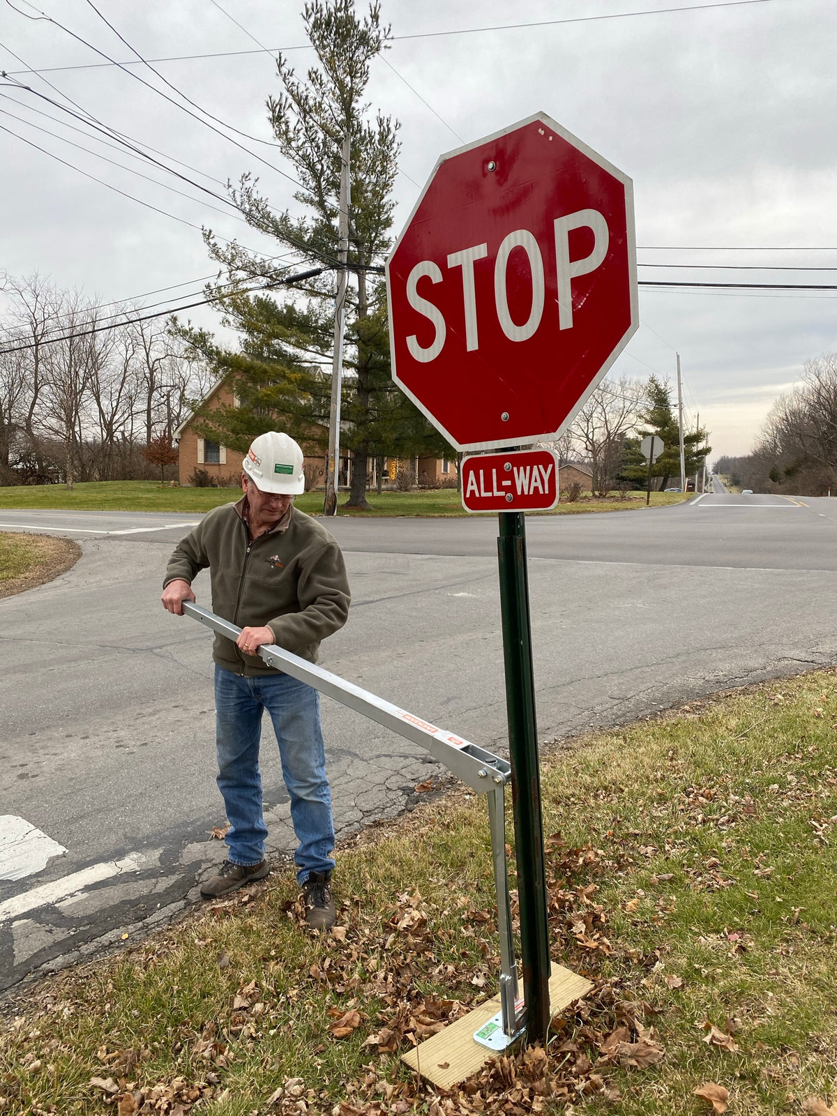 Use a wood board on soft soil